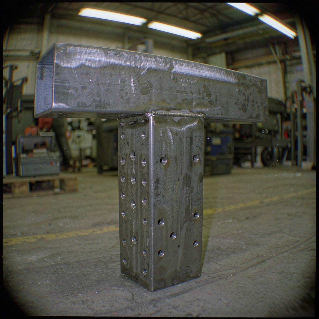 CNC machined welded steel machine frame with precision machined mounting surfaces